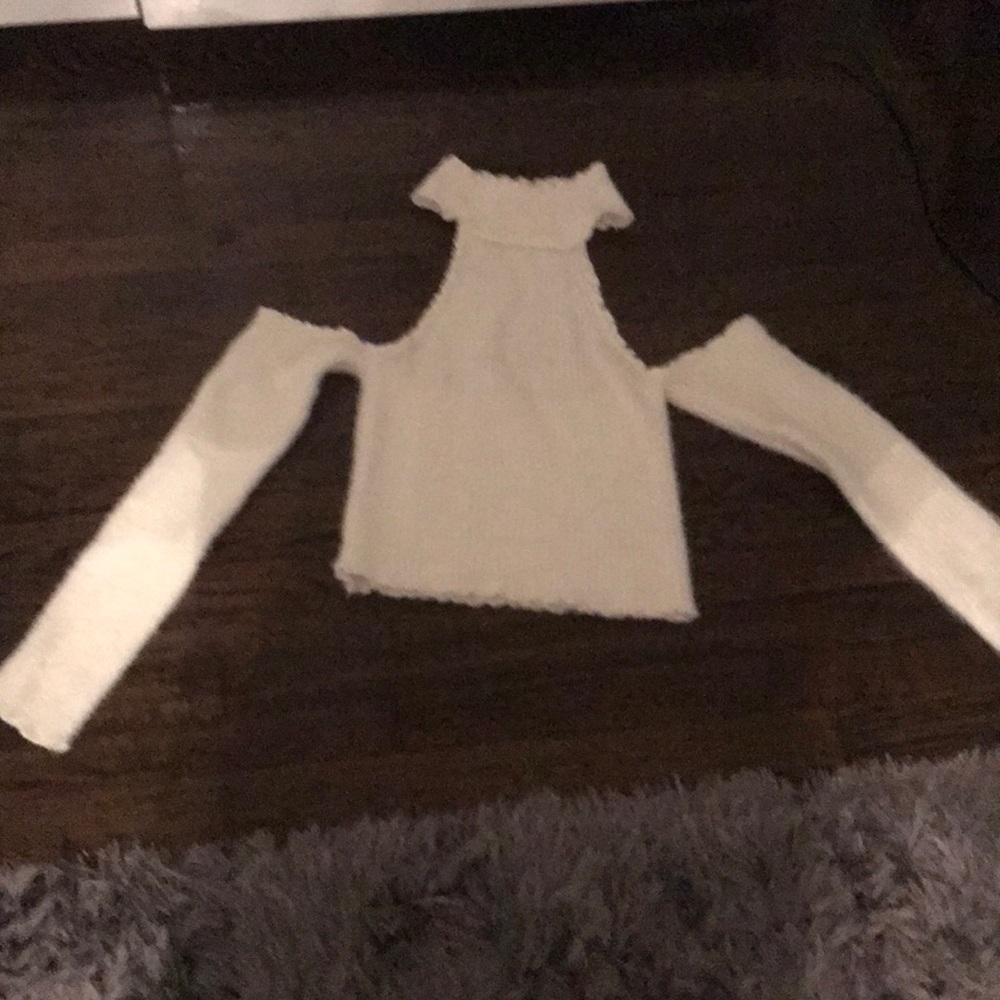 Sleeveless and Low back sweater